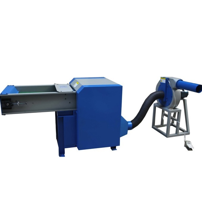 Fiber opening and pillow filling machine with single nozzle